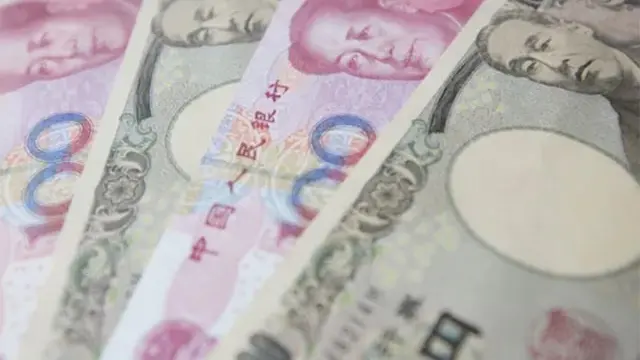 Divisas. yen, yuan