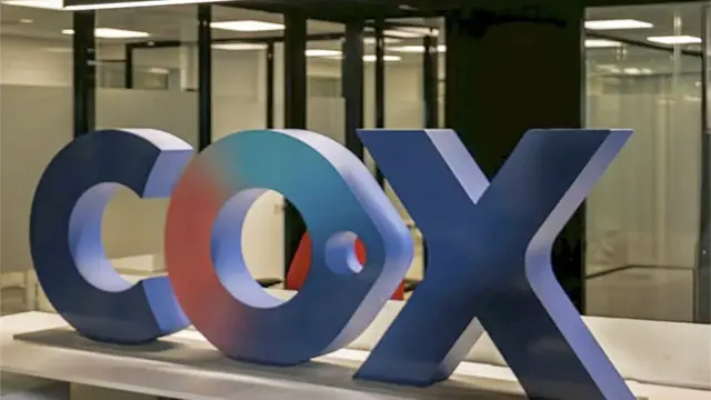 Logo de Cox