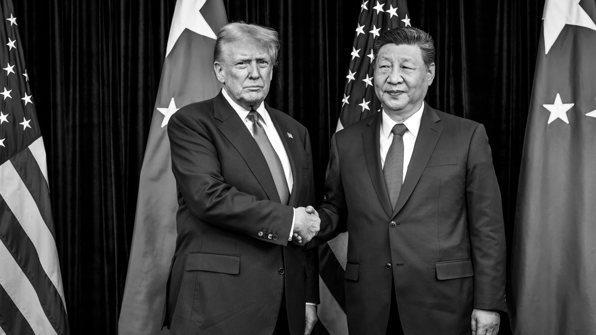 Donald Trump saluda a Xi Jinping.